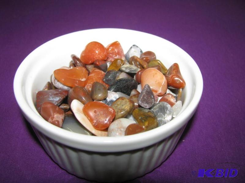 bowl of polished rocks bid on the r...