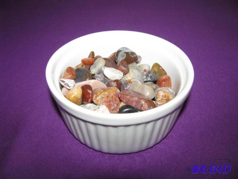 bowl of polished rocks bid on the r...