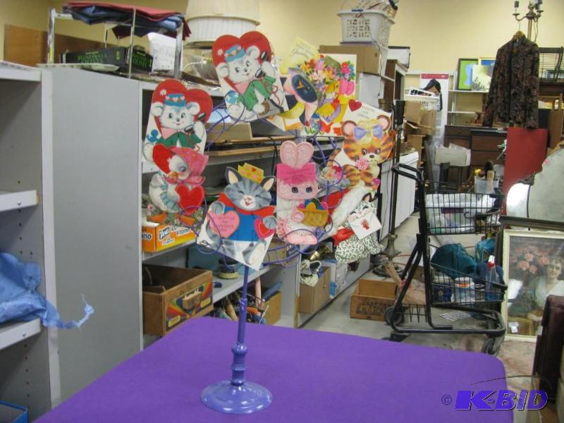 purple stand with vintage Easter an...