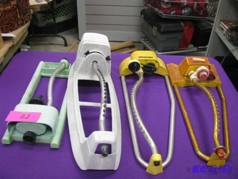 four vintage sprinklers...