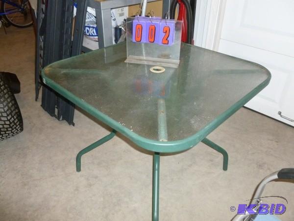 lot 2 image: 35 x 25 inch patio table. No chairs...