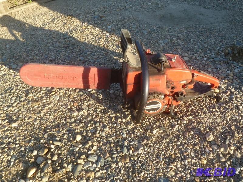 lot 29 image: Jonsered chain saw Model 49SP Need...