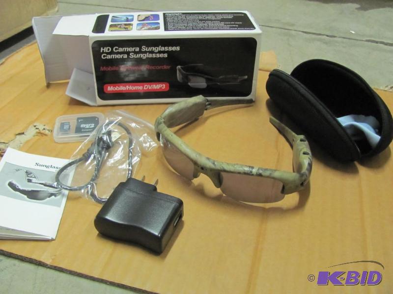 lot 32 image: Check out these cool camo sunglasse...