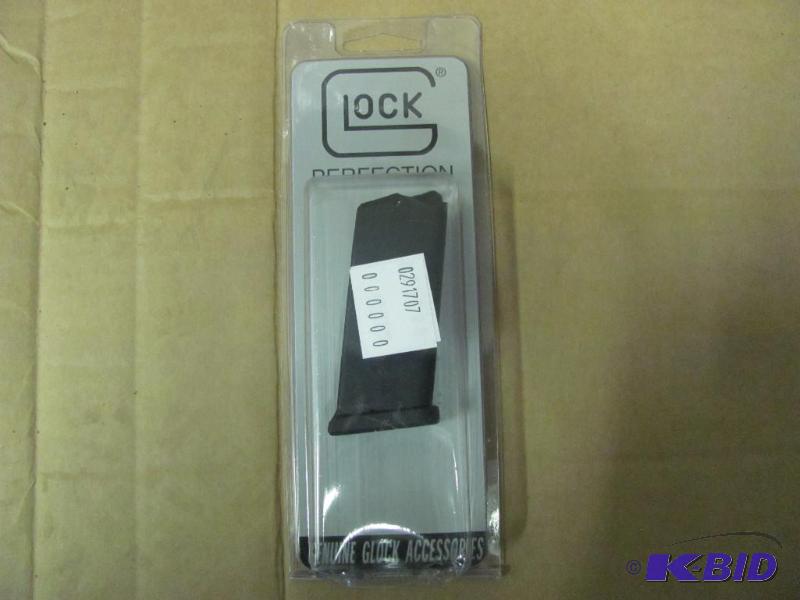 lot 63 image: This NEW (in original package) GLOC...