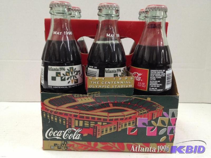 lot 9 image: Coca-Cola 1996 Atlanta Olympics 6 Pack, 4 Original Bottles