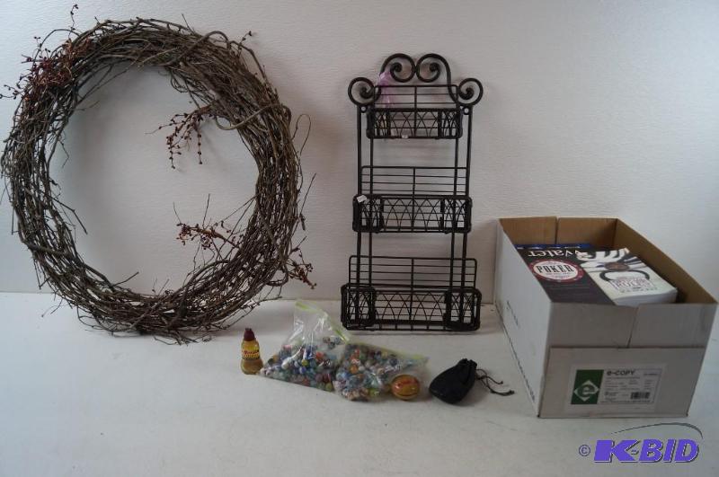 wreath, metal basket, marbles and books