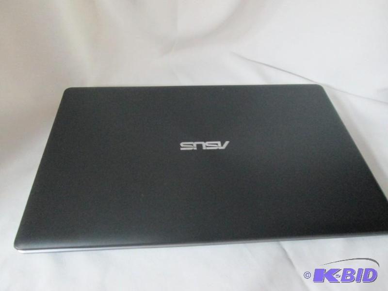 lot 2 image: ASUS 15.6 4GB Windows 8 Laptop