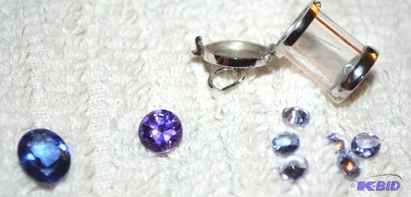 lot 10 image: 2  CT Tanzanite (set in ring for p...