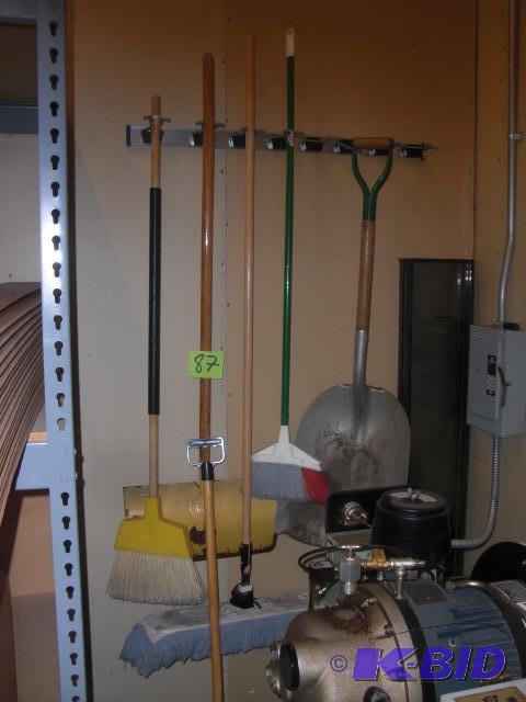 lot 87 image: Misc Brooms, Shovels, Mop.. Wall ha...