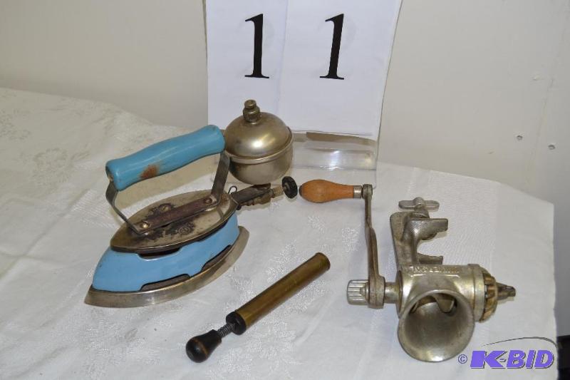 lot 11 image: Vintage Coleman gas iron & food mill