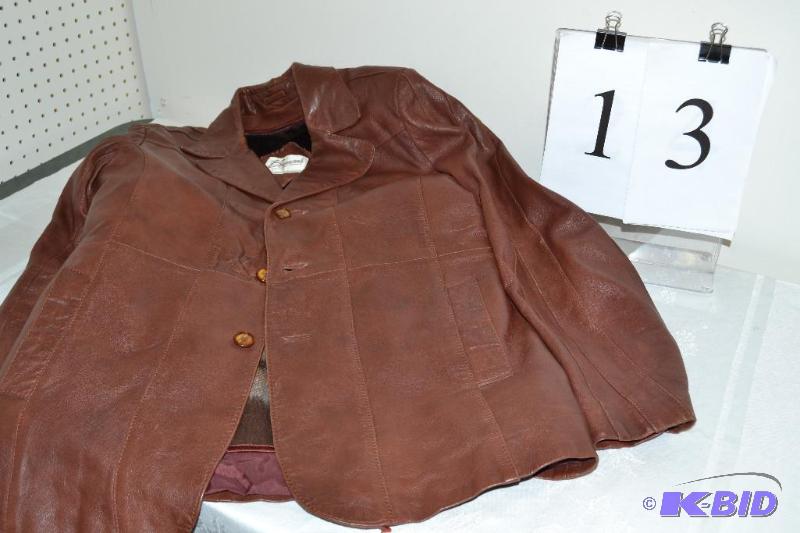 lot 13 image: Bermans Leather coat