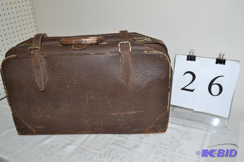 lot 26 image: Leather luggage