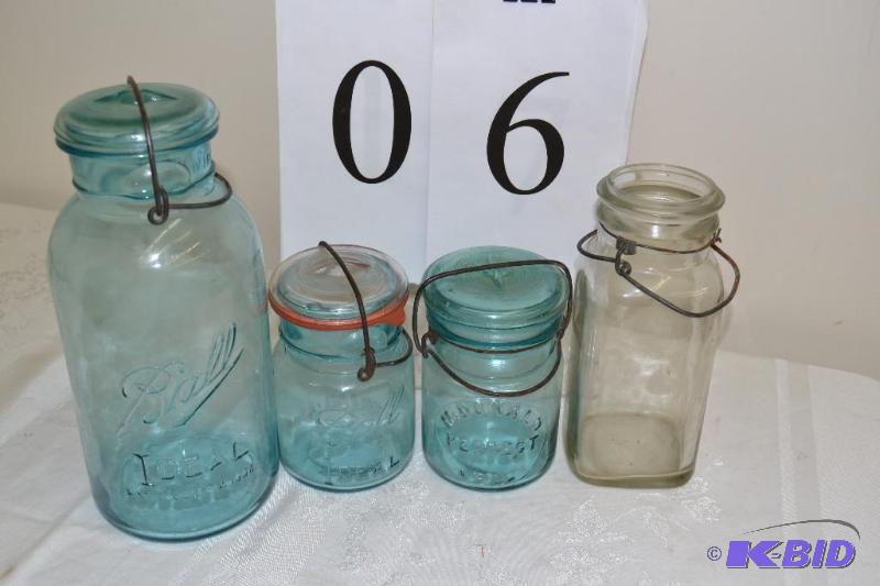 lot 6 image: Canning jars Blue & Clear