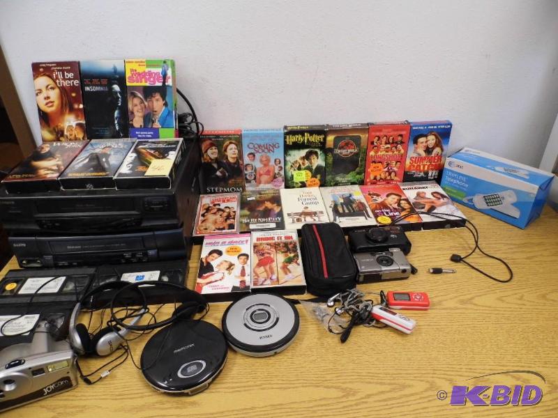 lot 46 image: 2 VCRs, VHS Tapes and Misc