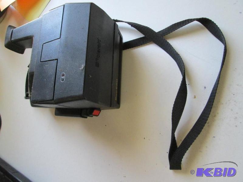 lot 106 image: Vintage polaroid camera...