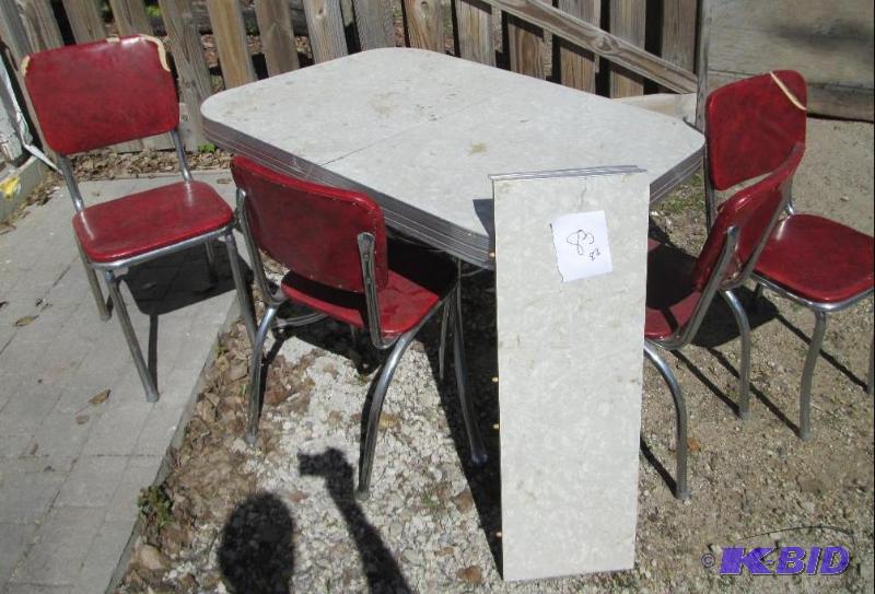 lot 83 image: Vintage retro table with 4 red chai...