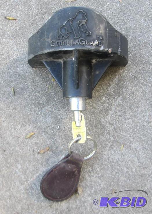 lot 90 image: Trailer hitch lock...