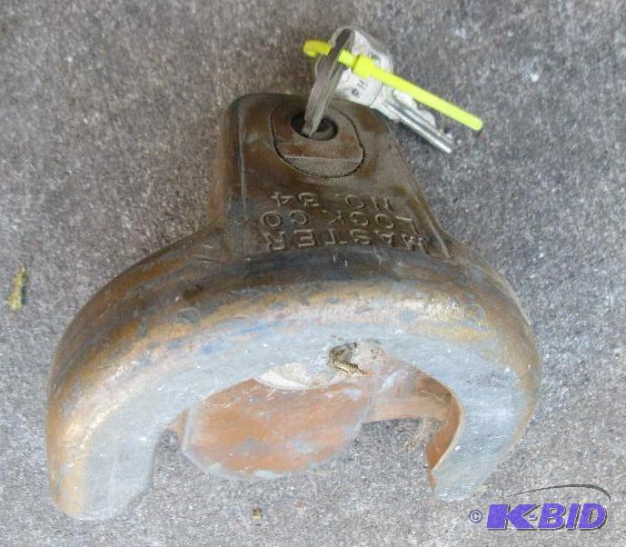 lot 91 image: Trailer hitch lock...