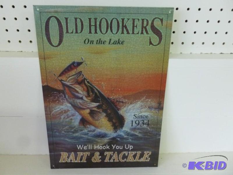 lot 133 image: Collectible metal sign that measure...