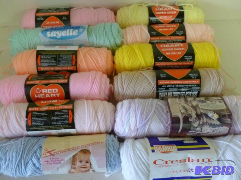 lot 214 image: Lot of twelve new rolls of yarn....