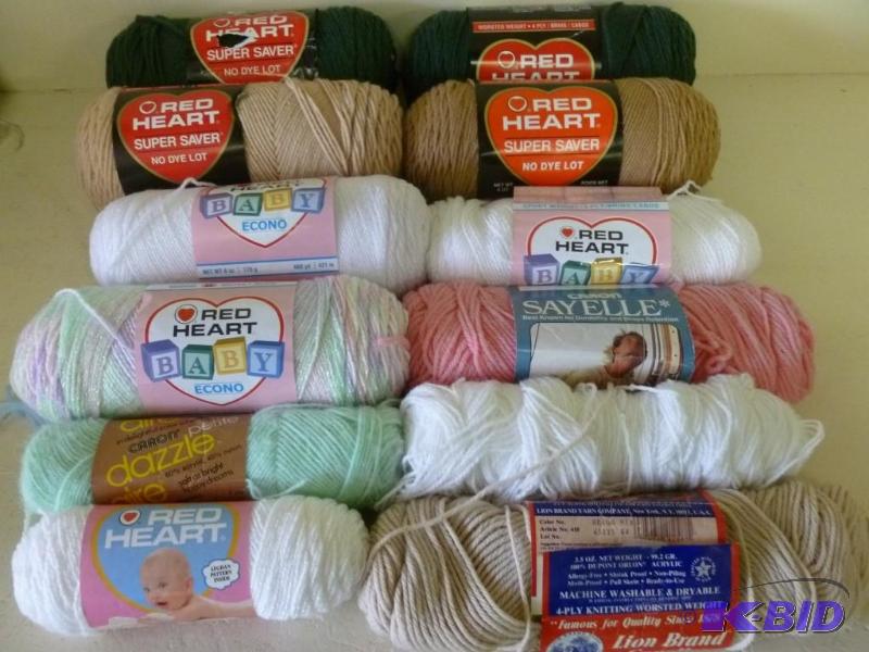 lot 215 image: Lot of twelve new rolls of yarn....