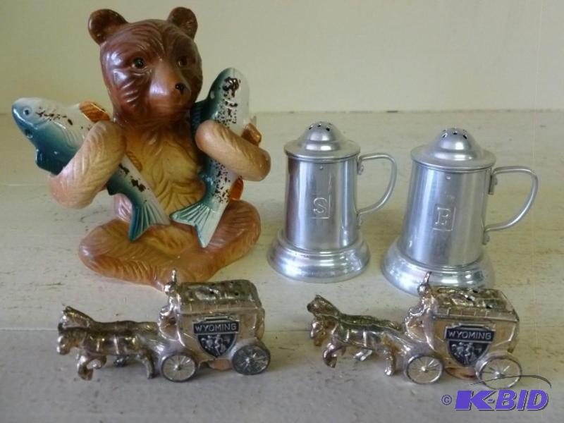 lot 331 image: Lot of three salt and pepper shaker...