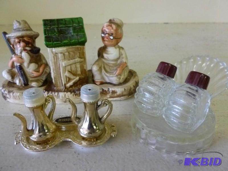 lot 335 image: Lot of three salt and pepper shaker...