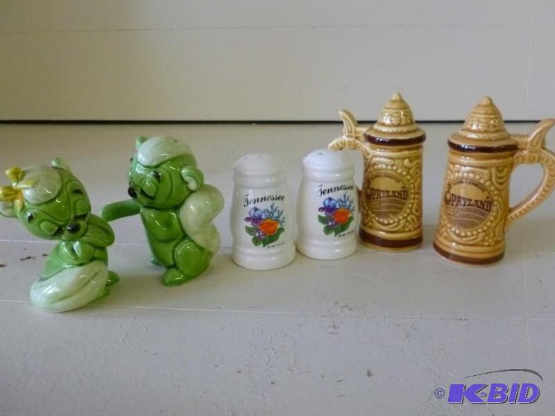 lot 340 image: Lot of three salt and pepper shaker...