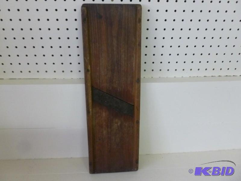 lot 95 image: Antique wooden cutting board that m...