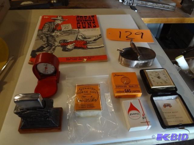 lot 129 image: Gun Book, Lighters, Clocks...