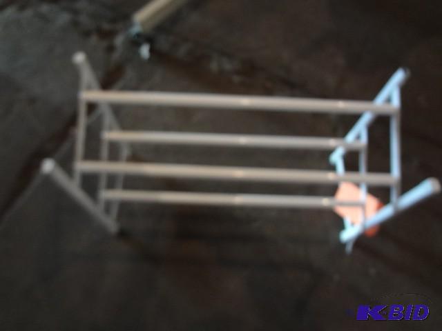 lot 20 image: Adjustable shoe rack...