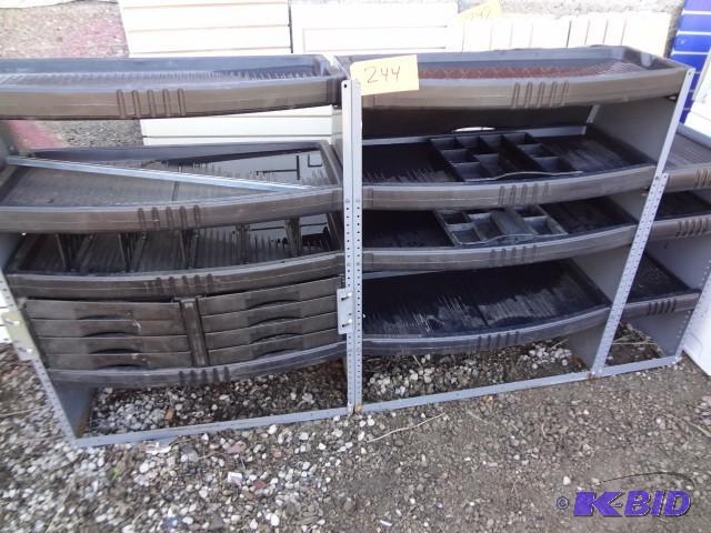 lot 244 image: Metal and plastic shelving system...