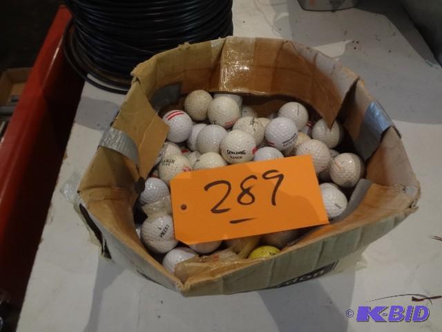 lot 289 image: Box of golf balls...