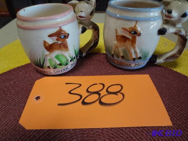 lot 388 image: Pair of milk cups, old, unusual...