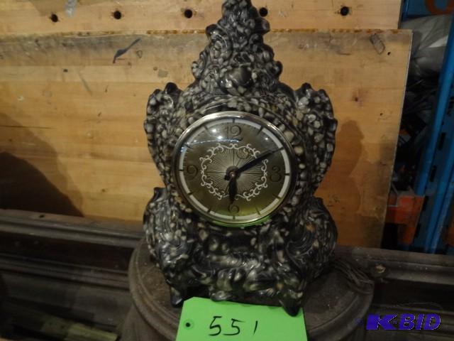 lot 551 image: Old Resin() Cast Clock, very unusu...