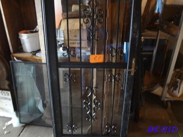 lot 87 image: Wrought IronGlass Storm Door...