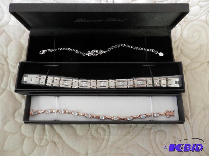 lot of 3 bracelets, 1 mens, 2 woman...