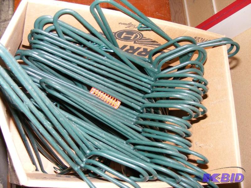 lot 25 image: Box of Green Plastic Hangers, over ...