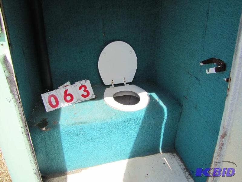 Portable toilet. Door needs hinge r...