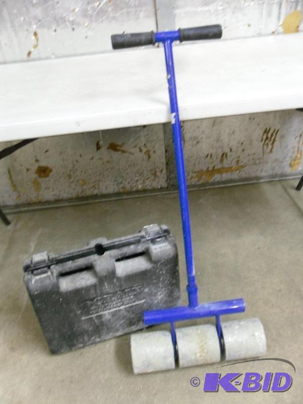 lot 15 image: Crain Flooring Roller with Case....