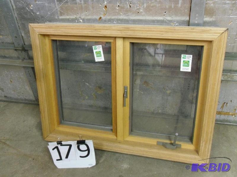 lot 179 image: Aluminum Exterior and Wood Interior...