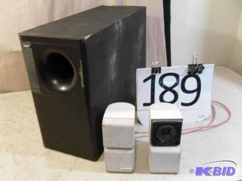 lot 189 image: Bose Sub Woofer and Cube Speakers. ...