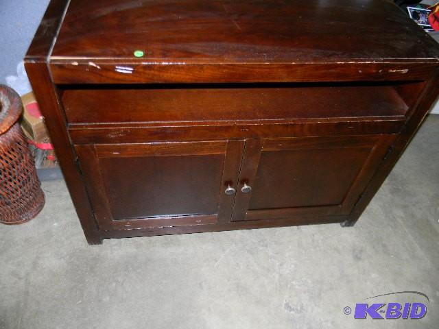 Wooden TV stand with storage undern...