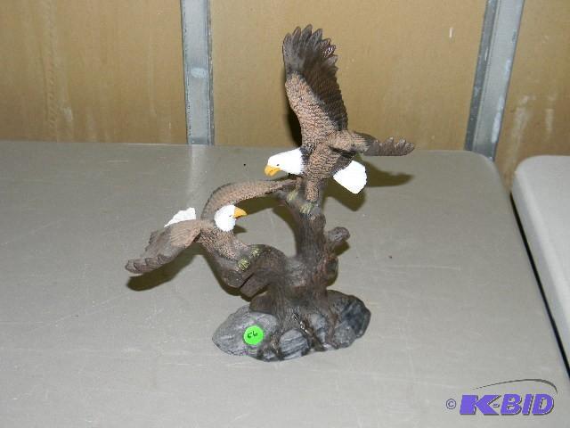 Porcelain eagle figurine with two e...