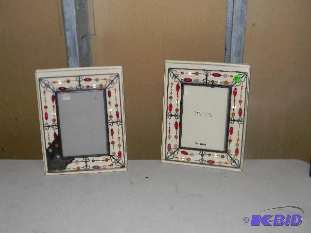 Lot of 2 new picture frames - holds...