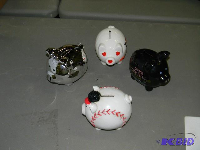 Lot of 4 piggy banks...