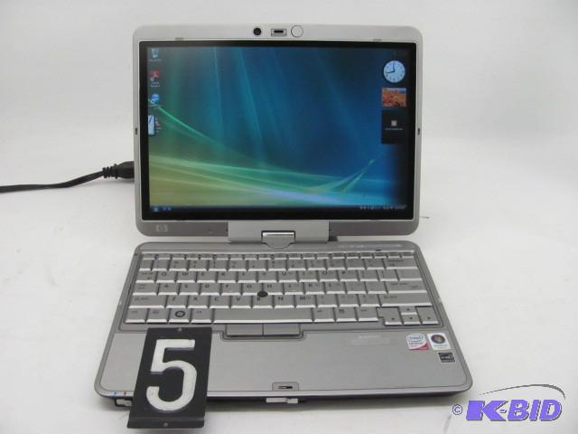 lot 5 image: HP compaq 2710P notebook pc. This u...