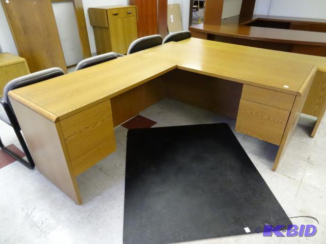 L shaped laminate office desk. 4 dr...
