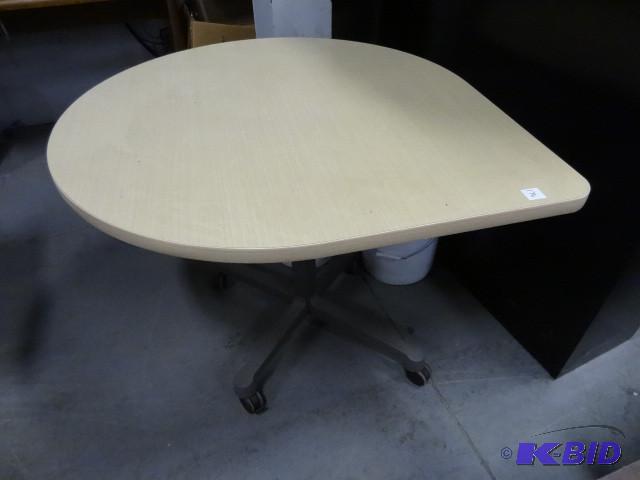 Tear drop table on wheels. 42&quot...