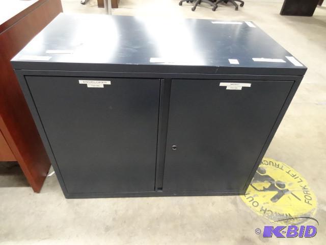 2 door metal cabinet. 36 x 20 x 29...